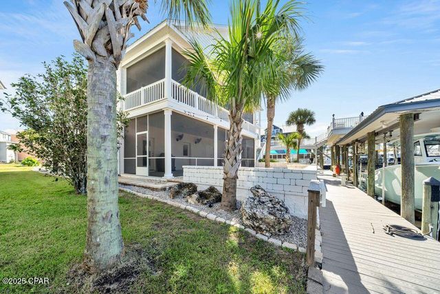 1001 Lighthouse Lagoon Court, Panama City Beach, FL 32407