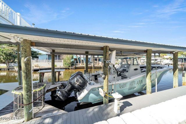 1001 Lighthouse Lagoon Court, Panama City Beach, FL 32407