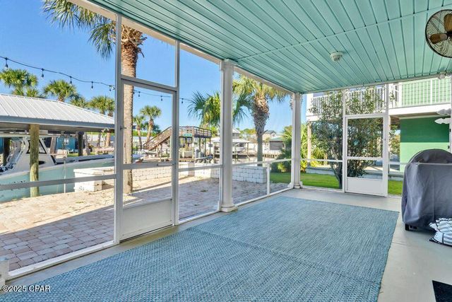 1001 Lighthouse Lagoon Court, Panama City Beach, FL 32407