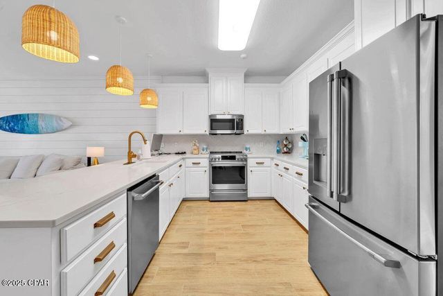 1001 Lighthouse Lagoon Court, Panama City Beach, FL 32407