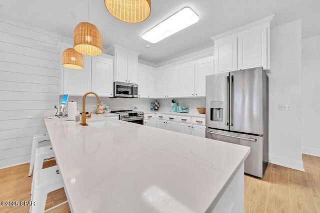 1001 Lighthouse Lagoon Court, Panama City Beach, FL 32407