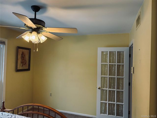 498 Cranston Lane, Ridge, NY 11961