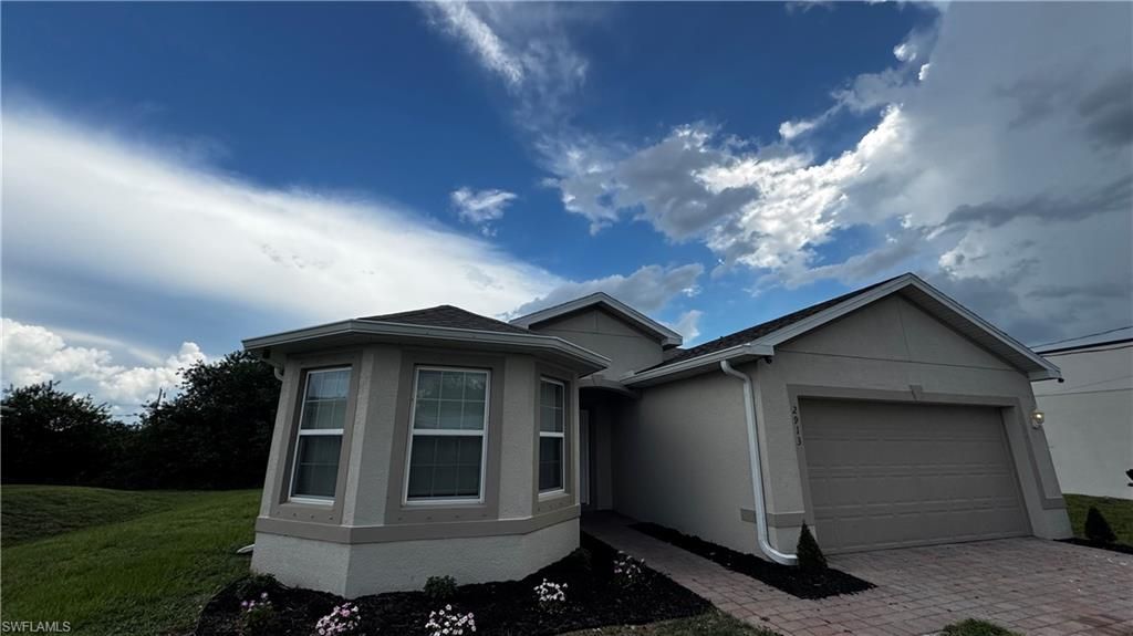 2913 65th ST W, LEHIGH ACRES, FL 33971 — exterior