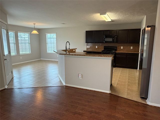 9403 Sunflower Ridge Lane, Houston, TX 77064