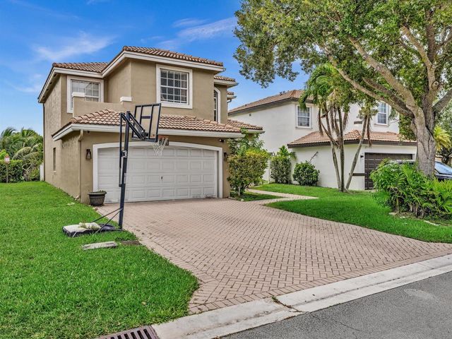 7145 CRESCENT CREEK Place, Coconut Creek, FL 33073