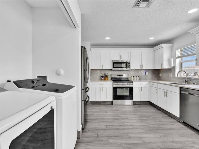 7145 CRESCENT CREEK Place, Coconut Creek, FL 33073