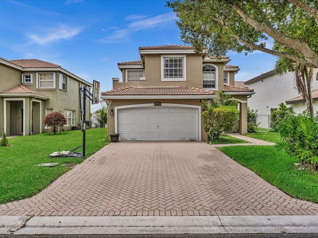 7145 CRESCENT CREEK Place, Coconut Creek, FL 33073