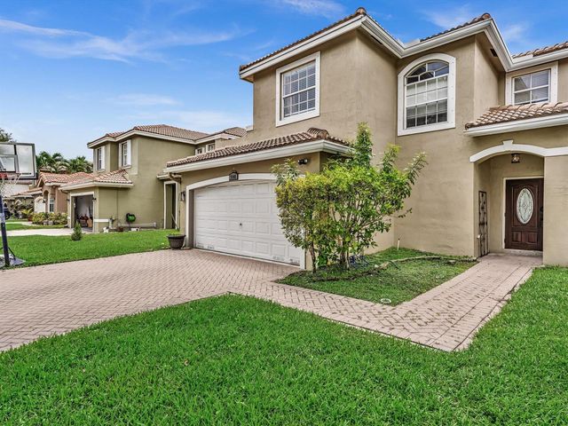 7145 CRESCENT CREEK Place, Coconut Creek, FL 33073