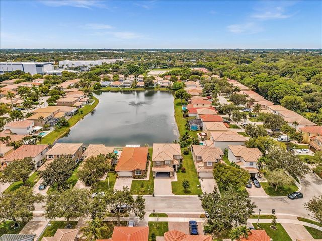 7145 CRESCENT CREEK Place, Coconut Creek, FL 33073