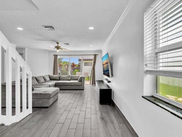 7145 CRESCENT CREEK Place, Coconut Creek, FL 33073