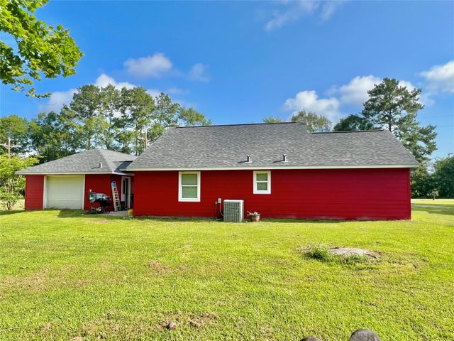 1406 County Road 3141 E, Cleveland, TX 77327
