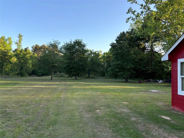 1406 County Road 3141 E, Cleveland, TX 77327