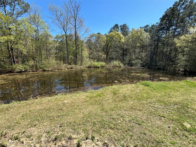 1406 County Road 3141 E, Cleveland, TX 77327