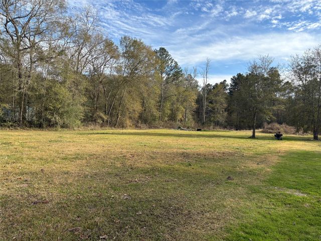 1406 County Road 3141 E, Cleveland, TX 77327