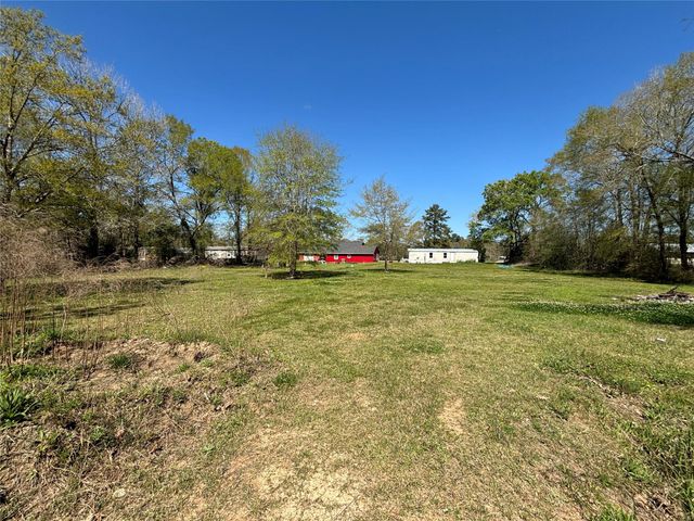 1406 County Road 3141 E, Cleveland, TX 77327