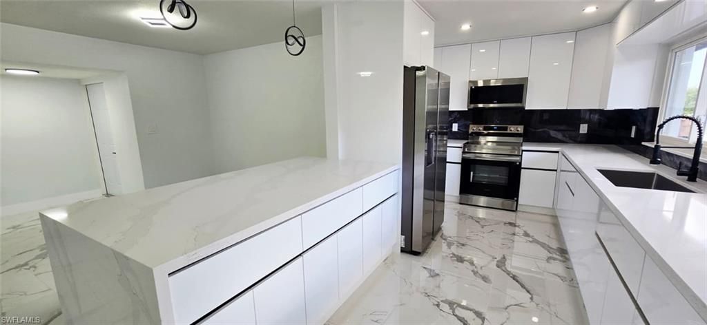 Image 11 of property listing at 238 SE 46th LN, Cape Coral, FL 33904