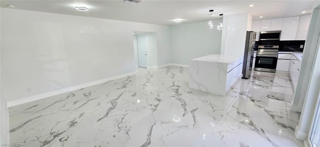 Image 5 of property listing at 238 SE 46th LN, Cape Coral, FL 33904