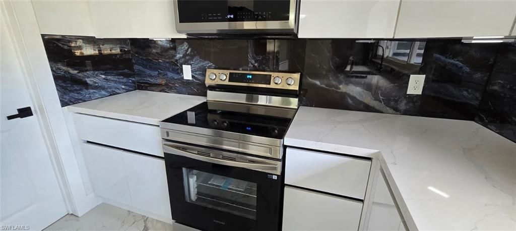 Image 9 of property listing at 238 SE 46th LN, Cape Coral, FL 33904