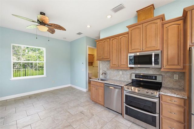 3210 GREAT HERON LOOP, Polk City, FL 33868