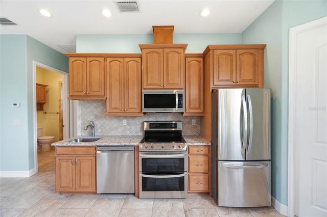3210 GREAT HERON LOOP, Polk City, FL 33868