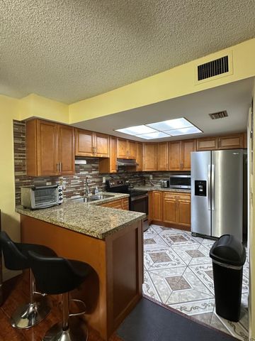 102 Pleasant Hill Lane, Tamarac, FL 33319
