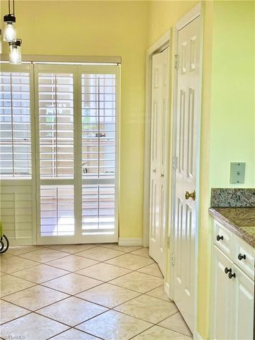 6015 Chardonnay LN 102, Naples, FL 34119