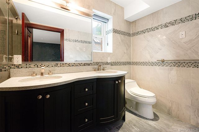 58-10 83rd Place, Middle Village, NY 11379