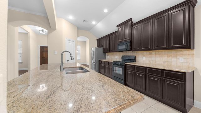 8403 Creekside Timbers Drive, Tomball, TX 77375