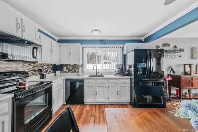 16 Magic Mountain Drive, Coram, NY 11727