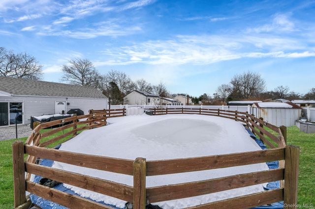 16 Magic Mountain Drive, Coram, NY 11727