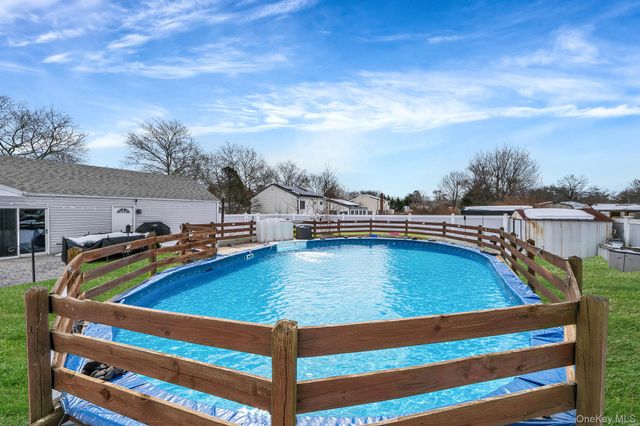 16 Magic Mountain Drive, Coram, NY 11727