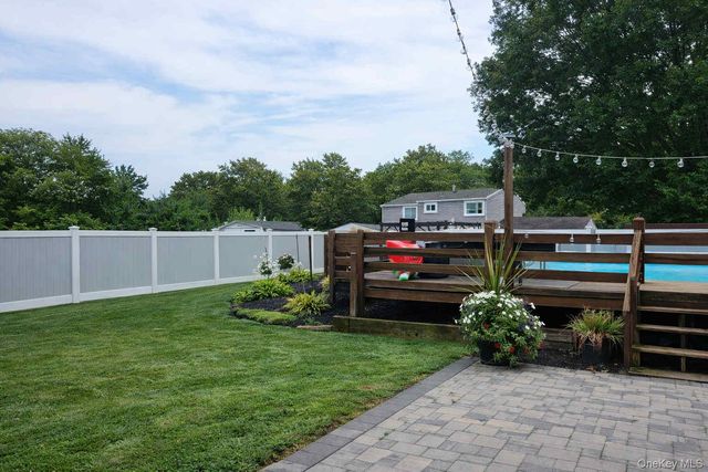 16 Magic Mountain Drive, Coram, NY 11727