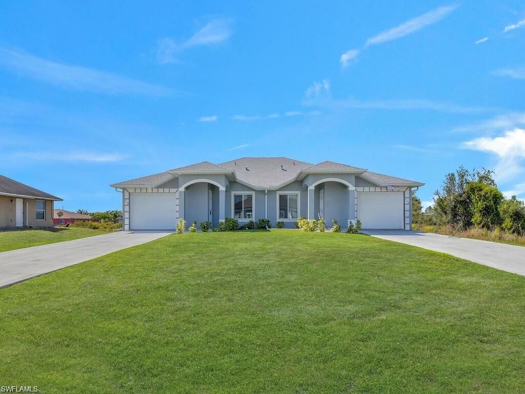 716/718 Harry AVE S, LEHIGH ACRES, FL 33973 — exterior