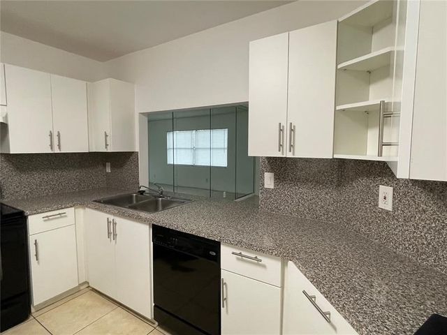 2392 Coral Springs Dr, Coral Springs, FL 33065