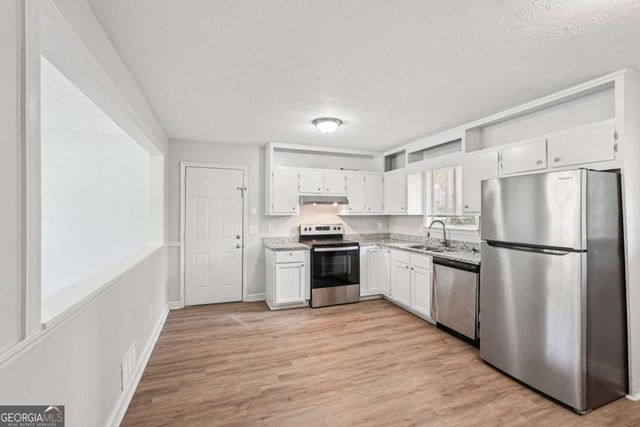 9157 Homewood Drive, Riverdale, GA 30274