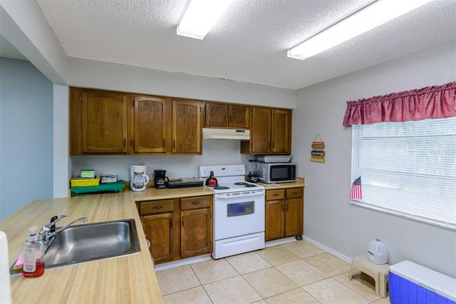 1139 ORANGE TREE CIRCLE E A, Palm Harbor, FL 34684