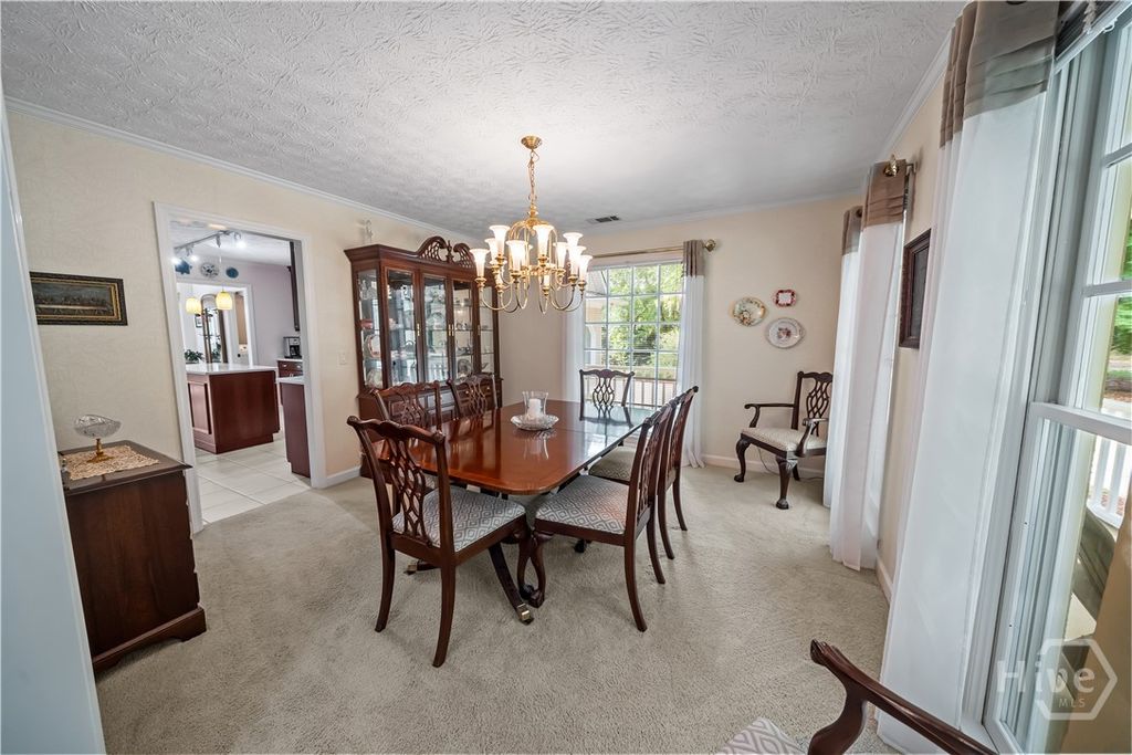 Image 12 of property listing at 791 Turkey Trot Trl, Richmond Hill, GA 31324
