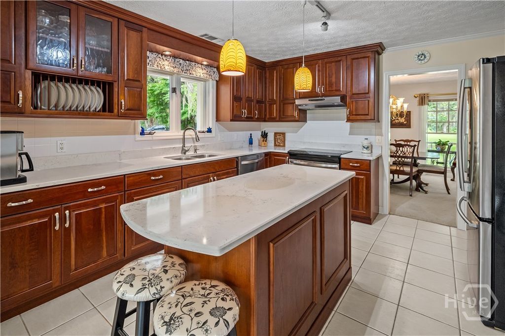 Image 17 of property listing at 791 Turkey Trot Trl, Richmond Hill, GA 31324