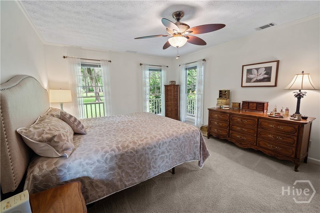 Image 31 of property listing at 791 Turkey Trot Trl, Richmond Hill, GA 31324