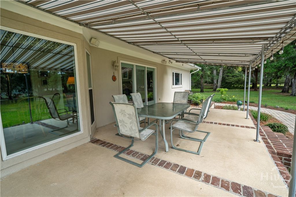 Image 54 of property listing at 791 Turkey Trot Trl, Richmond Hill, GA 31324