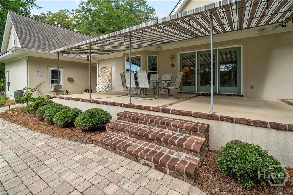 Image 55 of property listing at 791 Turkey Trot Trl, Richmond Hill, GA 31324