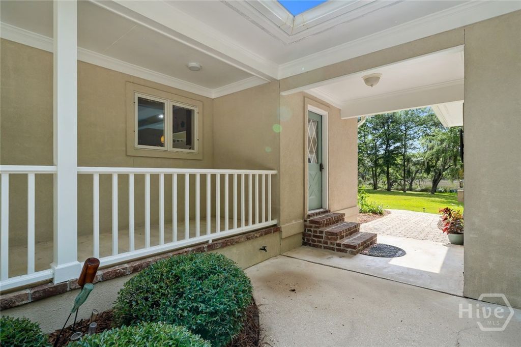 Image 6 of property listing at 791 Turkey Trot Trl, Richmond Hill, GA 31324