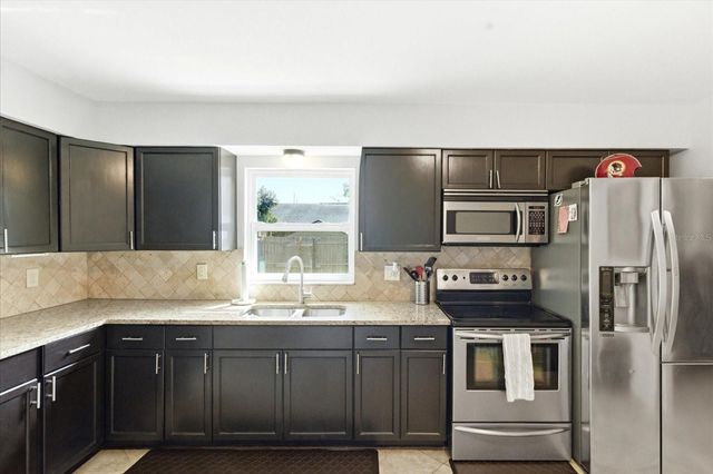 2110 W OKALOOSA AVENUE, Tampa, FL 33604