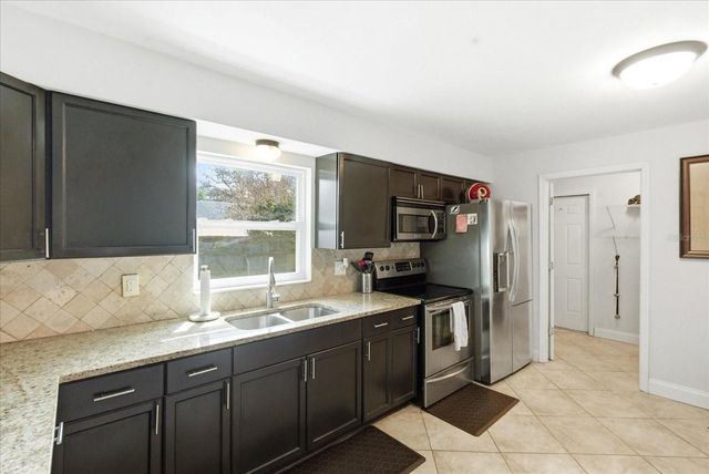 2110 W OKALOOSA AVENUE, Tampa, FL 33604