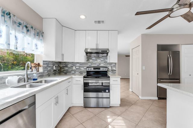 9855 NW 2nd Court, Plantation, FL 33324