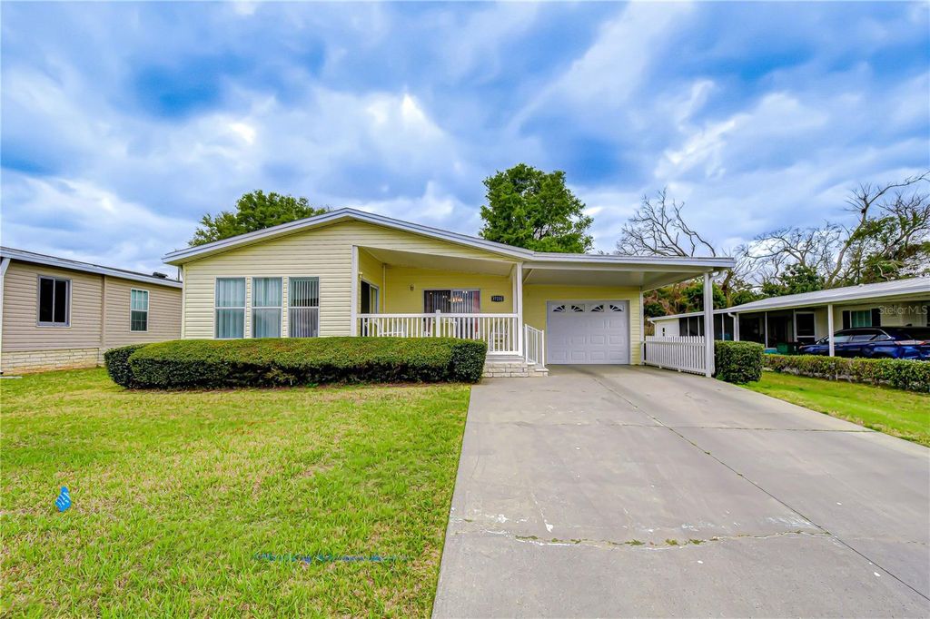 Image 1 of property listing at 37232 NEUKOM AVENUE, Zephyrhills, FL 33541