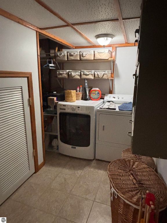 Image 25 of property listing at 8450 Bent Pine Drive, Lake Ann, MI 49650