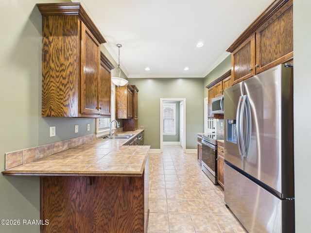 435 Chemin Metairie Road, Youngsville, LA 70592