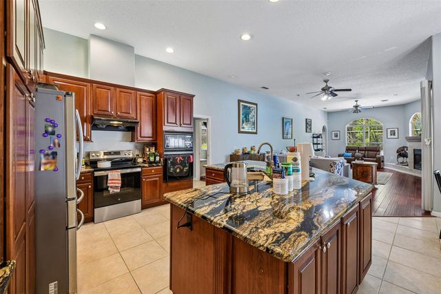 1344 TALL MAPLE LOOP, Oviedo, FL 32765