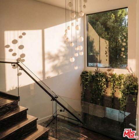 15834 High Knoll Road, Encino, CA 91436